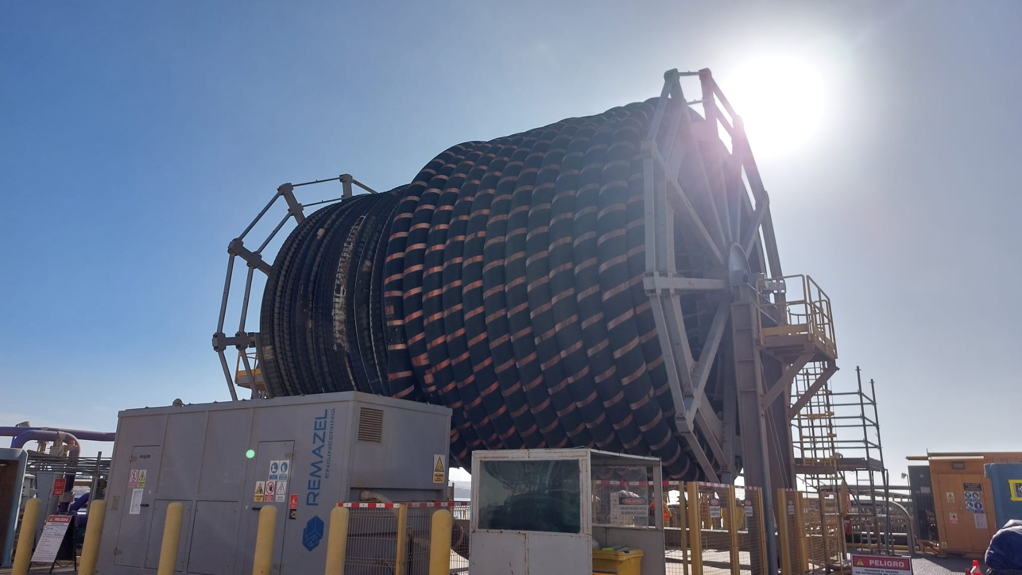 Large floating hose reel installed at a sulphuric acid import terminal in Peru, part of long-term marine infrastructure delivered by INCITIAS.