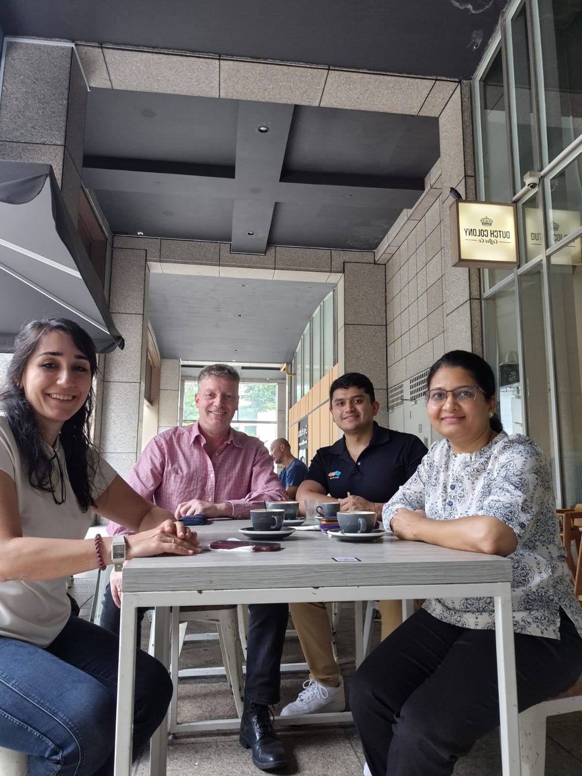 INCITIAS team members meeting in Singapore, reflecting collaboration across advisory and delivery teams.